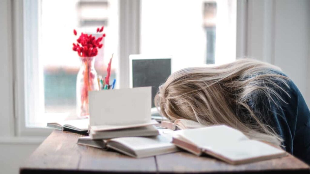 Photo of a woman with her head down