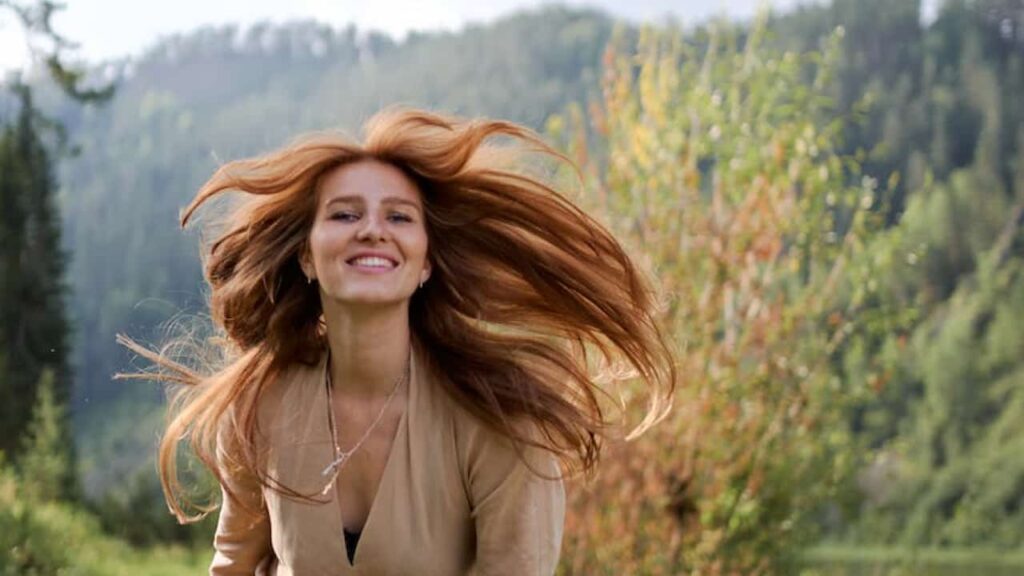 Photo of a woman smiling happily