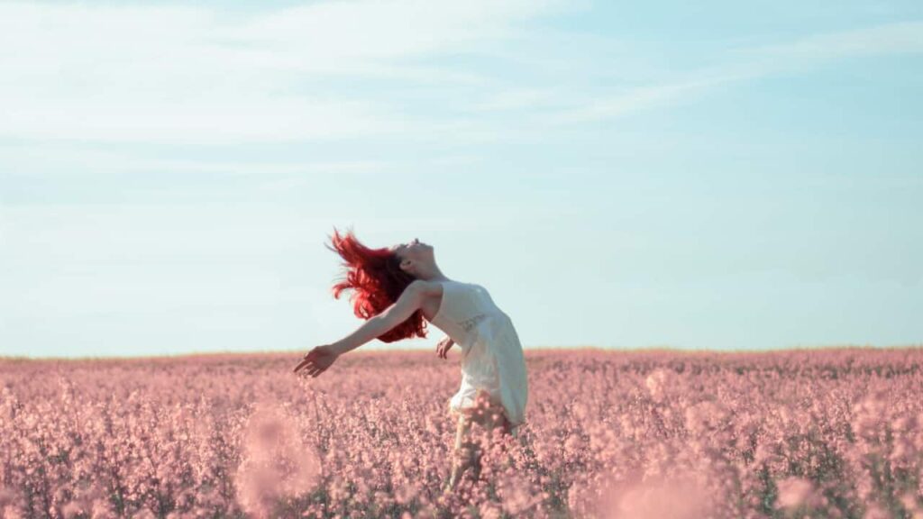 Photo of a woman in a flower field